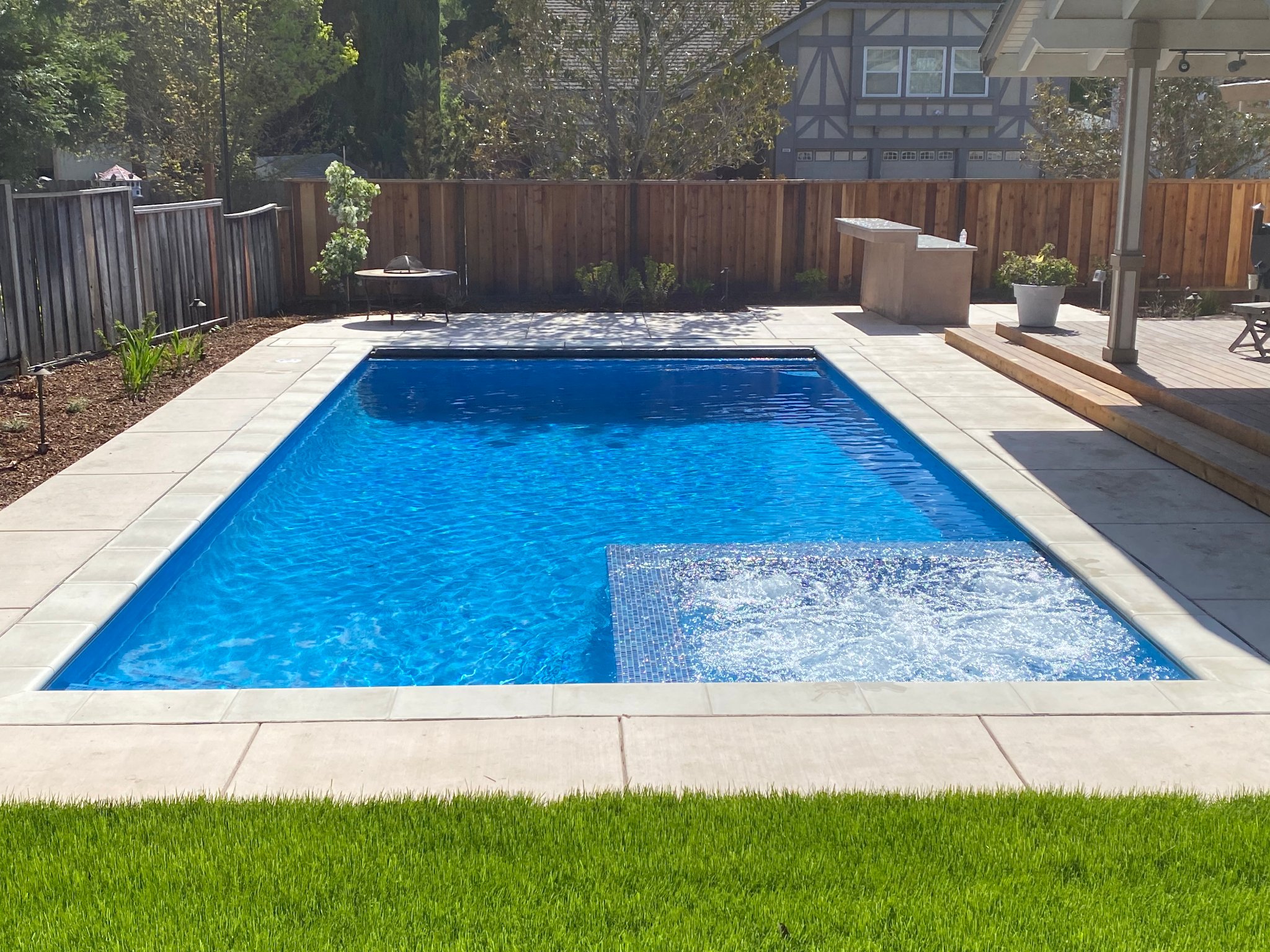 Pool steps and water feature
